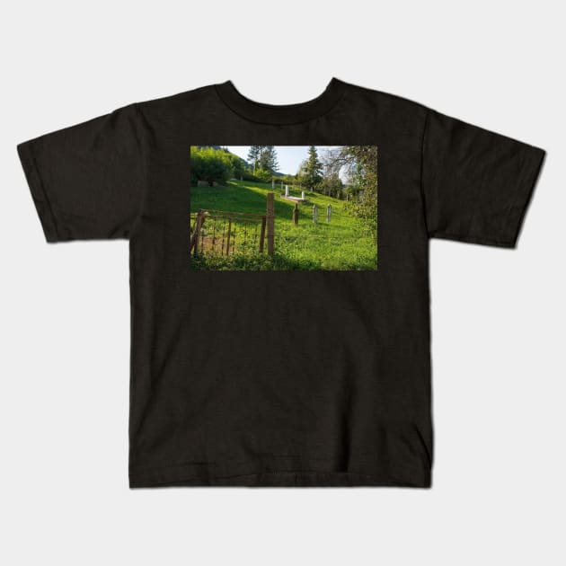 Hillside Graveyard in Kulen Vakuf, Bosnia Kids T-Shirt by jojobob